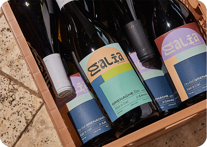 Bottle of Galia Grenache Blanc in a box with other bottles